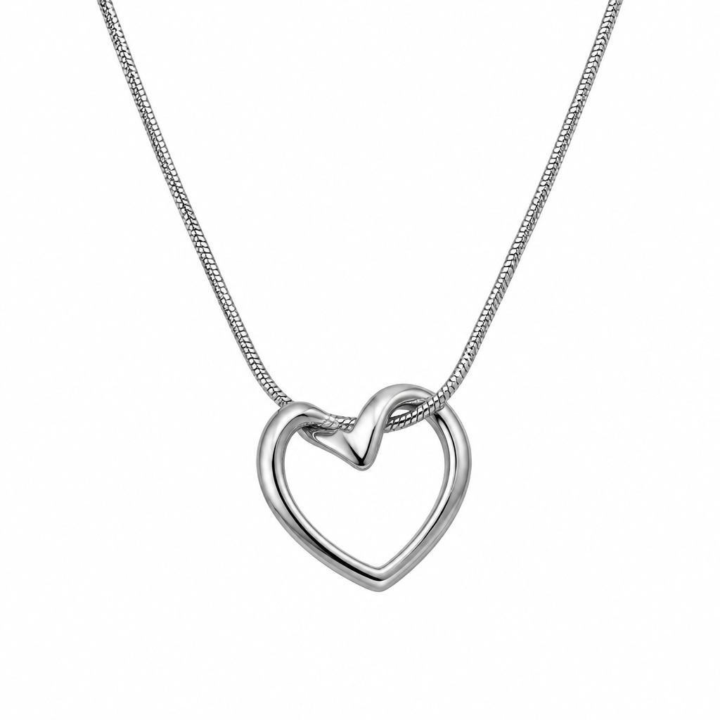 Silver-tone open heart pendant necklace against a white background