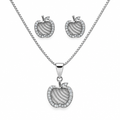 Silver-tone apple pendant necklace and matching studs on white