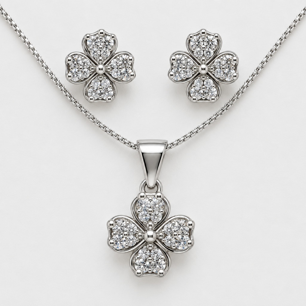 Close view of silver-tone flower pendant and matching stud earrings